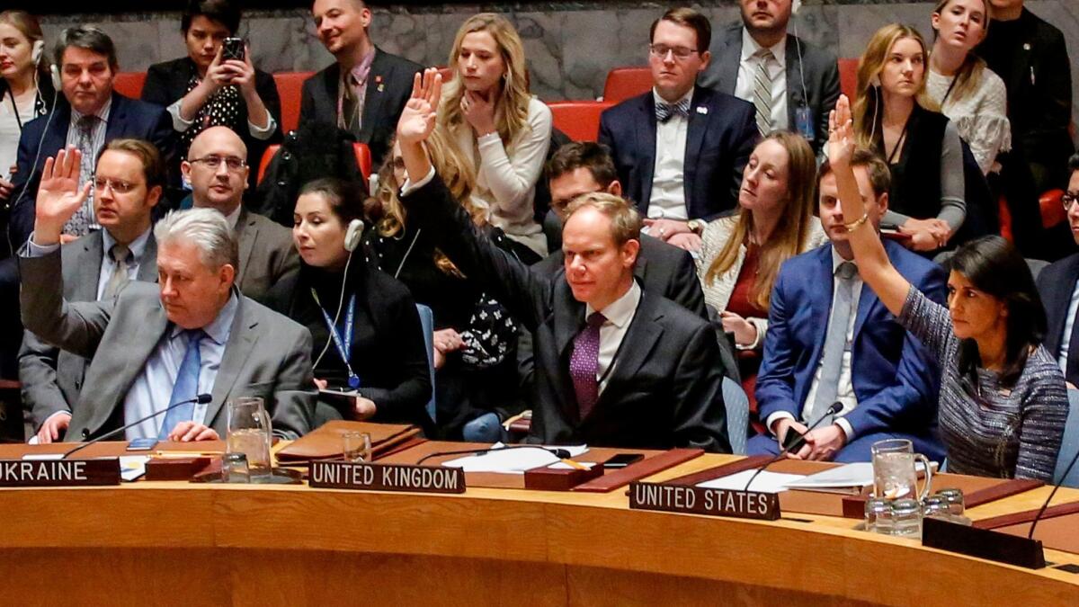 Members of the United Nations Security Council vote 15 to 0 on Dec. 22 to impose new sanctions on North Korea. Taiwan is investigating whether a ship violated those sanctions to sell North Korea fuel.