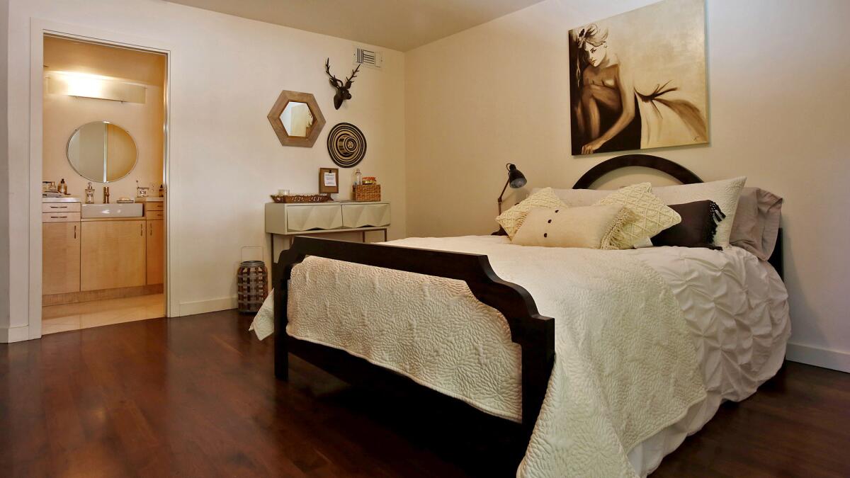 A bedroom and bathroom ready to be rented out on Airbnb in Kelly Dangor's condo in West Hollywood.