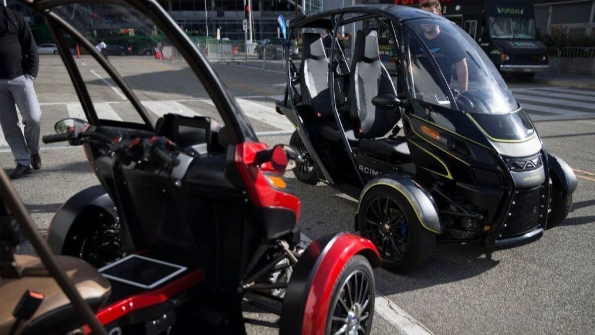 The Arcimoto SRK, a tandem two-seat, three-wheeled electric vehicle, was available for test-driving at "Automobility," the 2017 L.A. Auto Show at the L.A. Convention Center.