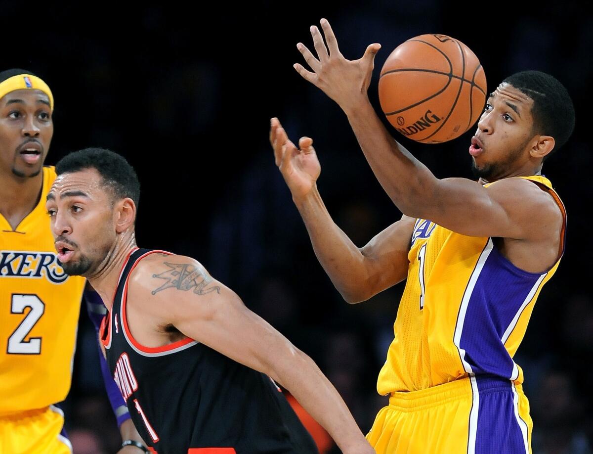 Darius Morris, who started 17 games for the Lakers this season, steals the ball from the Trail Blazers' Jared Jeffries.