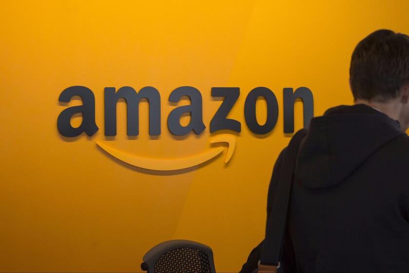 SEATTLE, WA - JUNE 16: A visitor checks in at the Amazon corporate headquarters on June 16, 2017 in Seattle, Washington. Amazon announced that it will buy Whole Foods Market, Inc. for over $13 billion. (Photo by David Ryder/Getty Images) ** OUTS - ELSENT, FPG, CM - OUTS * NM, PH, VA if sourced by CT, LA or MoD **