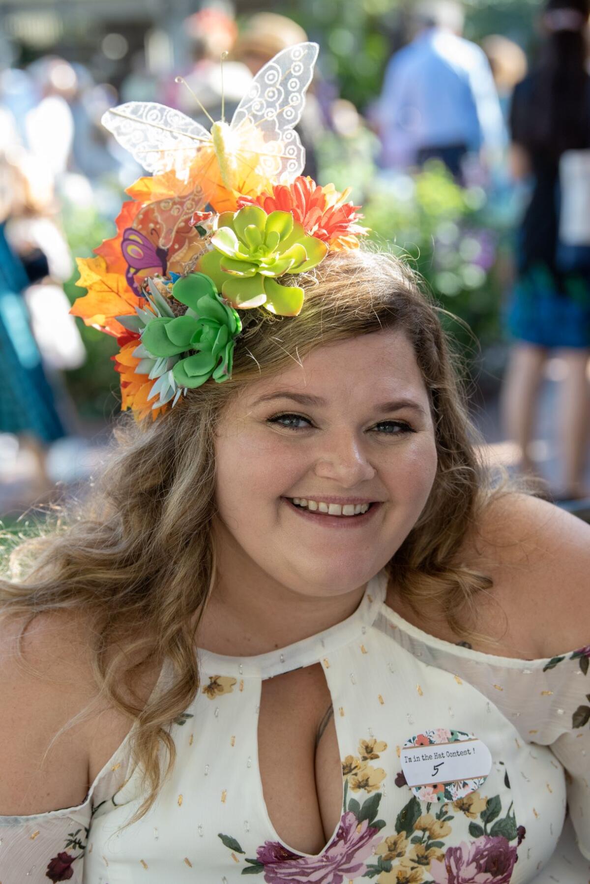 Mary Kennedy won a $100 gift certificate for best garden-themed hat.