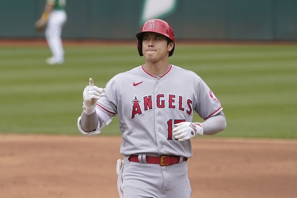 Shohei Ohtani will play both ways during his start for the Angels Friday night. (AP Photo/Jeff Chiu)