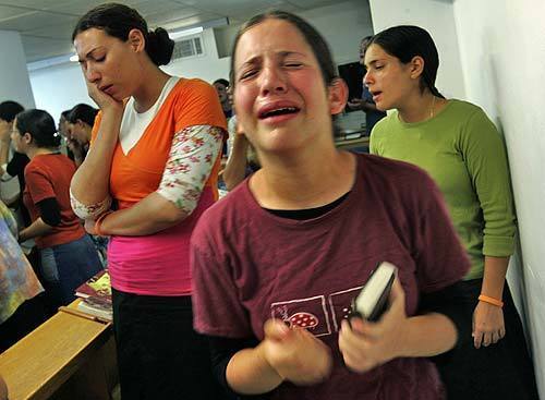 Women gather together at one of the Synagogues in Neve Dekalim to mourn on Tisha B'Av, the Jewish holiday marking the destruction of the Temple. This year the holiday is even more emotional due to the upcoming deadline for their evacuation.