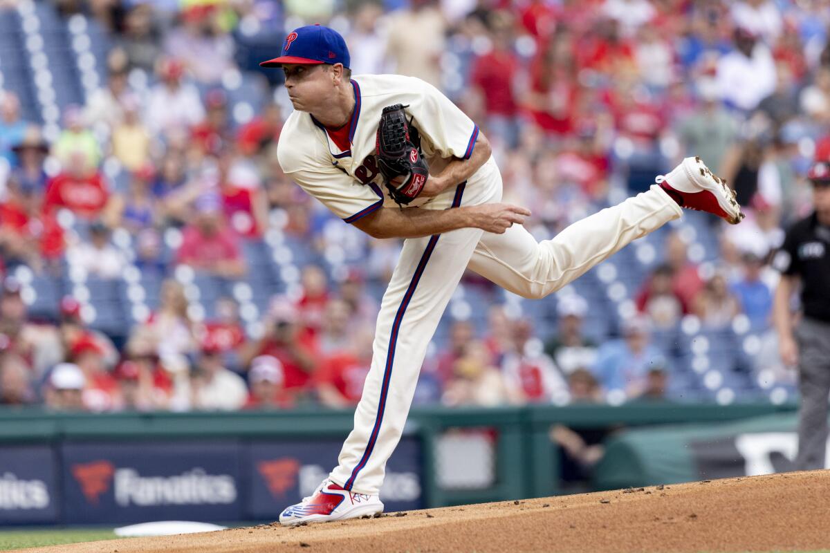 Philadelphia Phillies starting pitcher Kyle Gibson throws during the first inning of a baseball game against the St. Louis Cardinals, Saturday, July 2, 2022, in Philadelphia. (AP Photo/Laurence Kesterson)