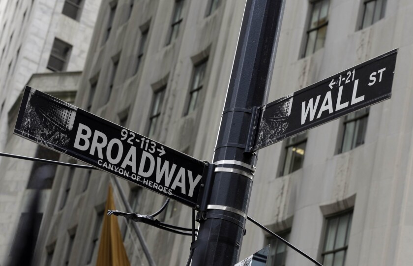 The corner of Broadway and Wall Street in New York's Financial District.