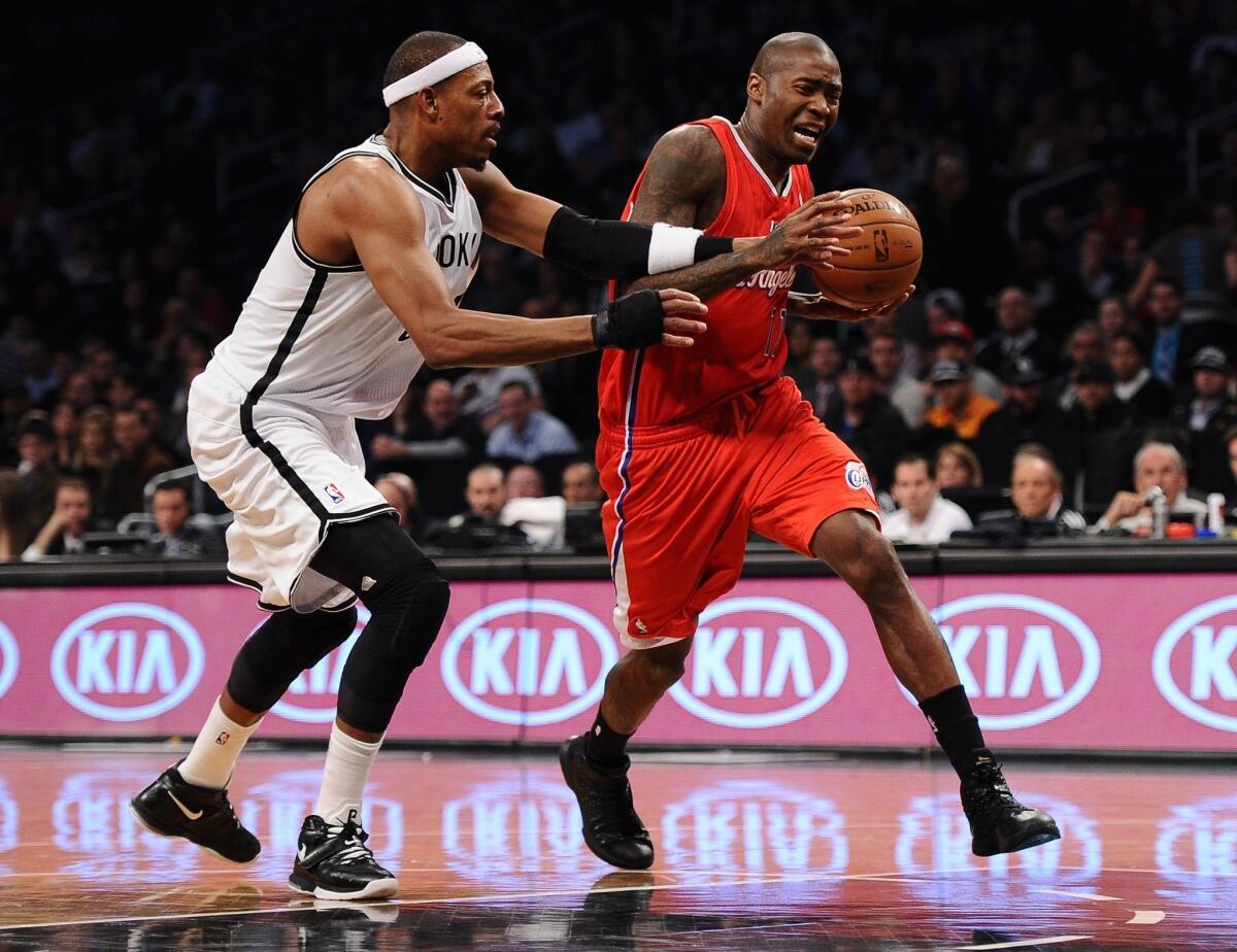 Clippers shooting guard Jamal Crawford tries to drive past Brooklyn Nets forward Paul Pierce during the Clippers' 102-93 loss Thursday night.