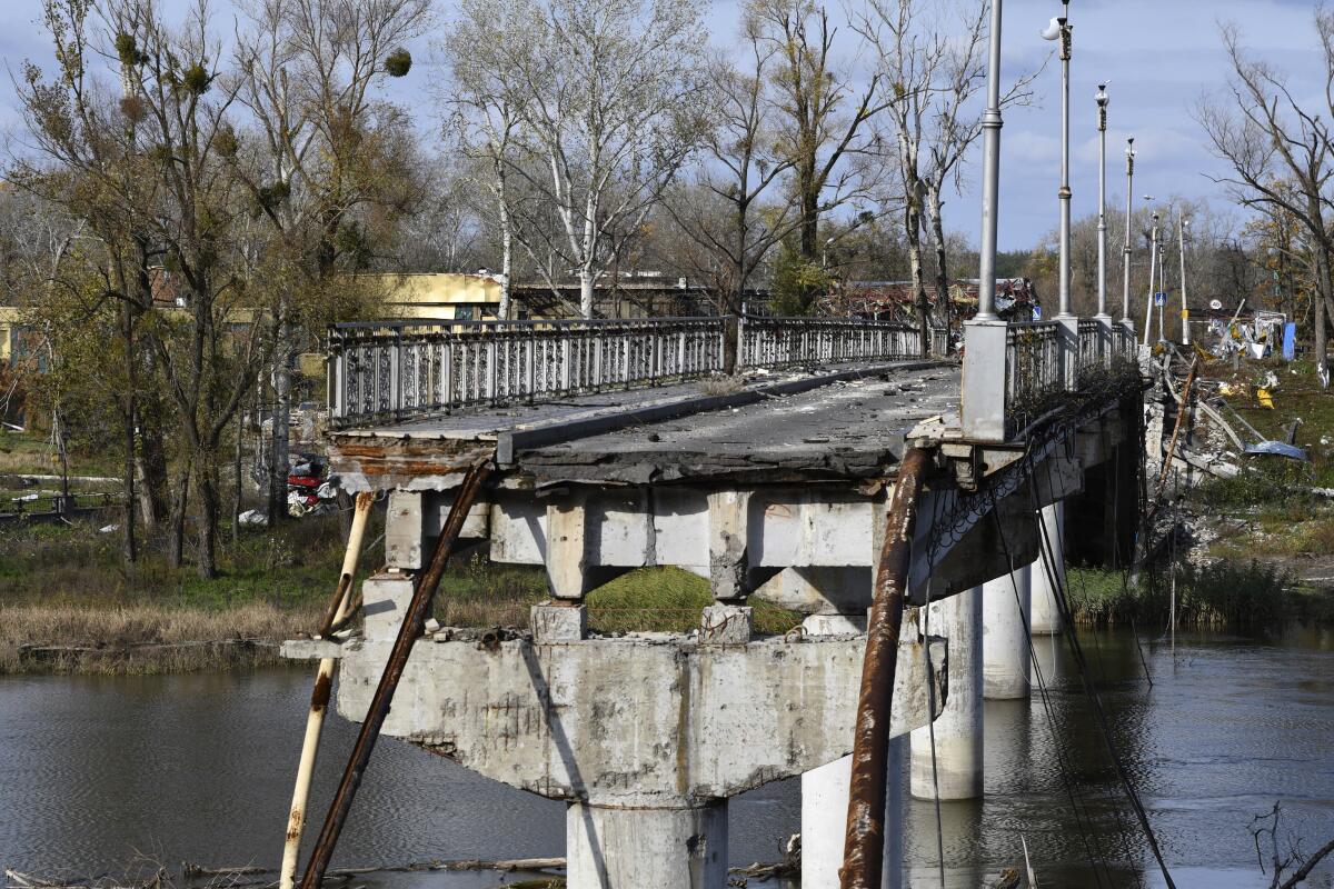 A view of a destroyed bridge across the Siverskyi-Donets River.