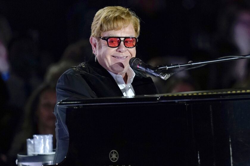 FILE - Elton John performs on the South Lawn of the White House in Washington, Friday, Sept. 23, 2022. Elton John is scheduled to perform at the Glastonbury Festival in June, in what organizers say will be his last-ever show in Britain. The festival announced Friday, Dec. 2, 2022 that the star will play the 2023 festival’s final night on June 25 (AP Photo/Susan Walsh, File)