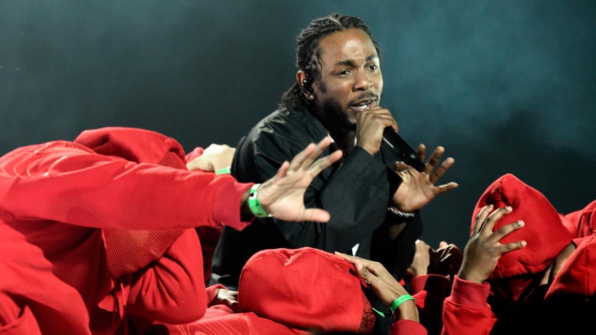 Hip-hop star Kendrick Lamar won five Grammy Awards and performed during the awards show.