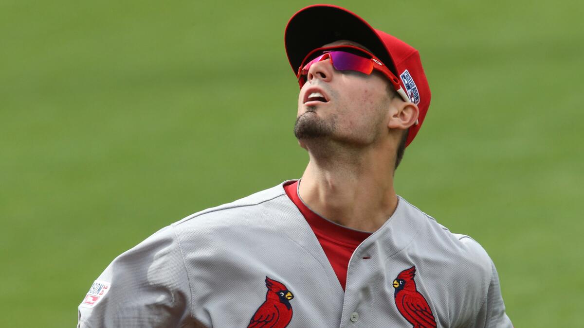 St. Louis Cardinals right fielder Randal Grichuk tracks a fly ball hit by San Francisco's Travis Ishikawa during the first inning of the Giants' 5-4 win in Game 3 of the National League Championship Series on Tuesday.