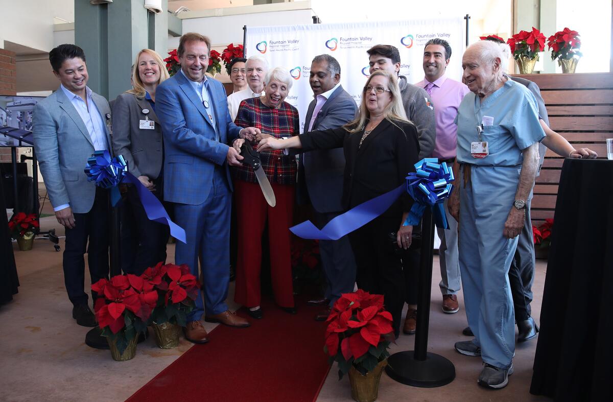 The ribbon-cutting ceremony for the new neurointerventional angiography suite at Fountain Valley Regional Hospital.