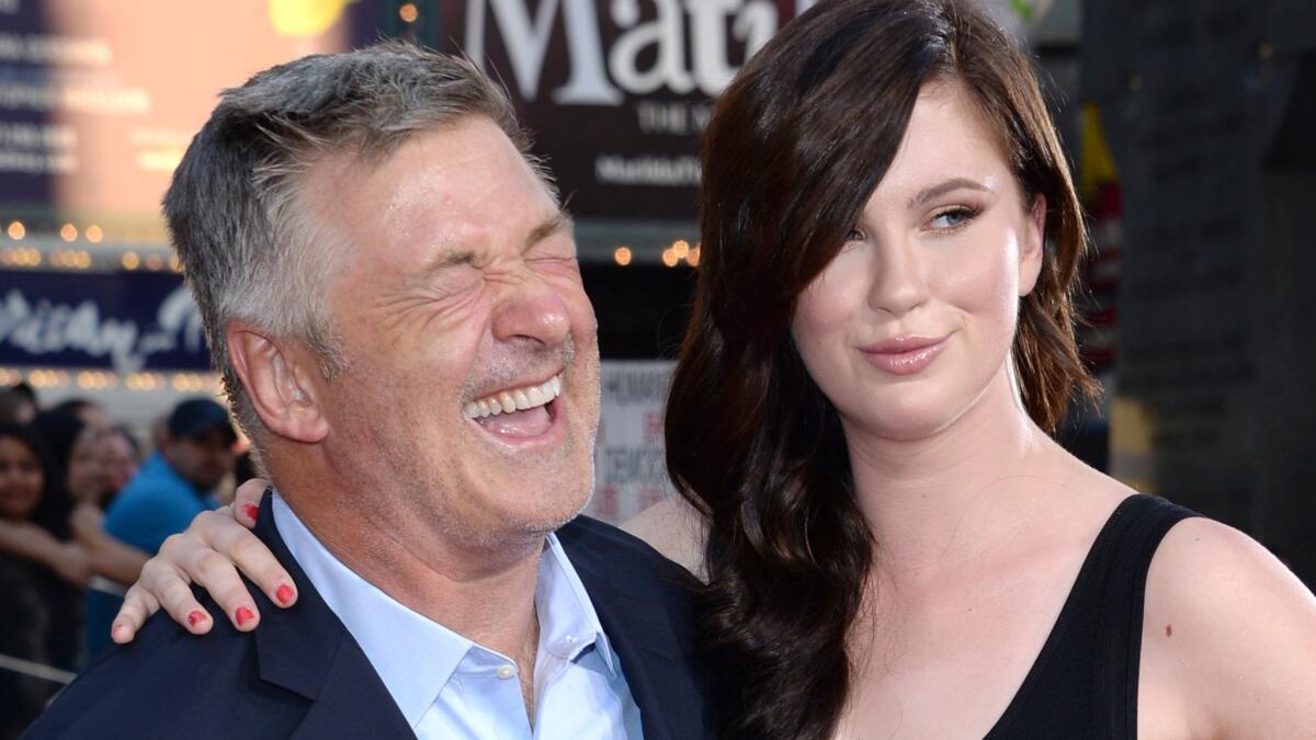 Alec Baldwin and daughter Ireland Baldwin enjoy the red carpet at the "Mission: Impossible -- Rogue Nation" premiere in Times Square on Monday.