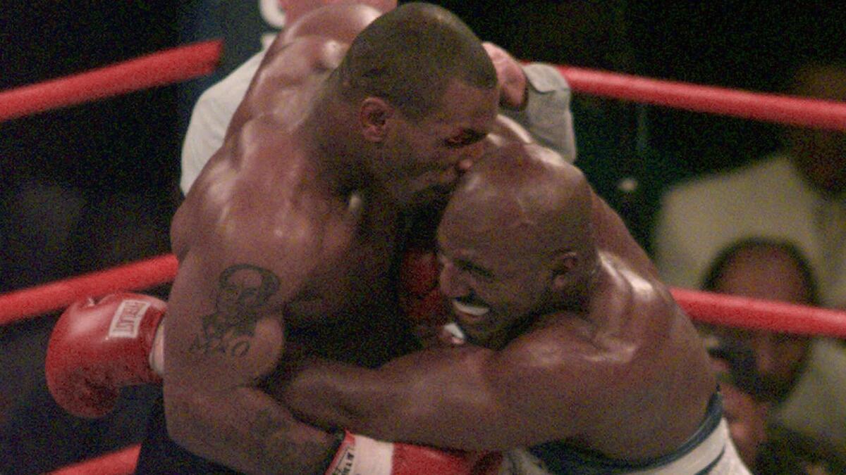 Heavyweight fighter Mike Tyson bit Evander Holyfield's right ear during a 1997 showdown in Las Vegas, leading to his disqualification.