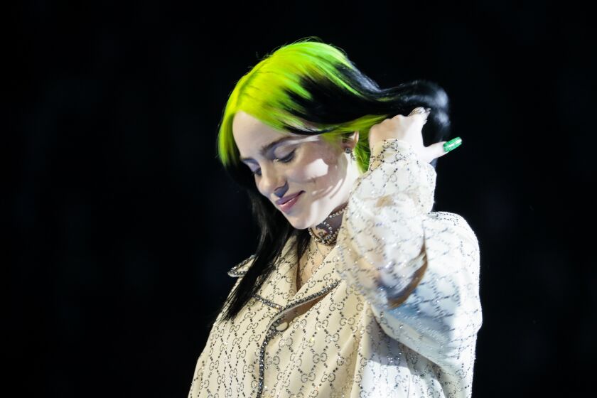 LOS ANGELES, CA - January 26, 2020: Billie Eilish performs on stage at the 62nd GRAMMY Awards at STAPLES Center in Los Angeles, CA. (Robert Gauthier / Los Angeles Times)