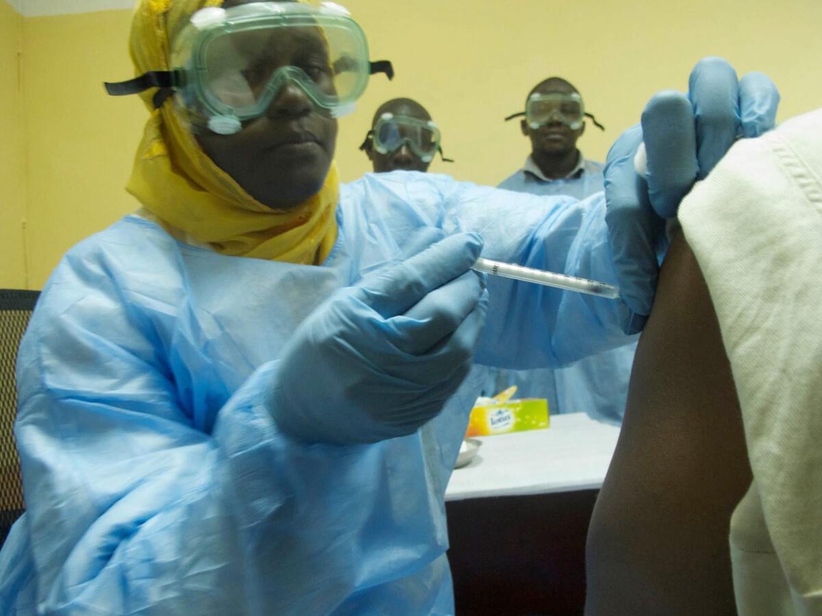 A volunteer recieves the Ebola vaccine cAd3-EBO-Z in Bamako, Mali, this month, as part of human trials of the vaccine in Africa.