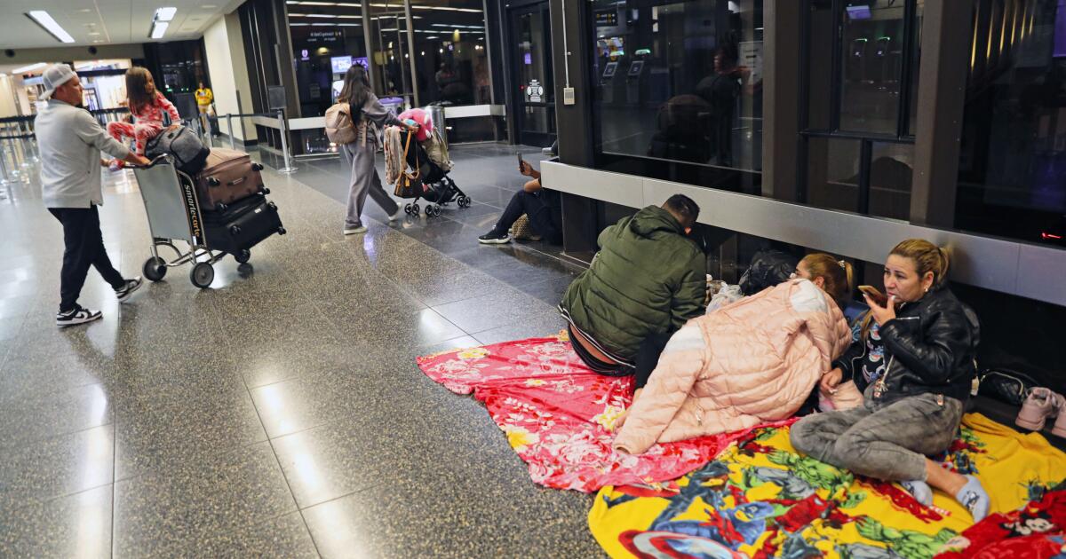 With nowhere else to go, more than 100 migrants sleep each night at the San Diego airport