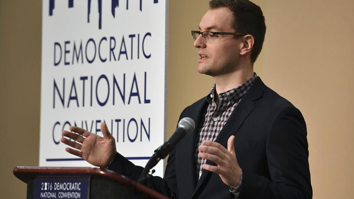 Robby Mook, campaign manager for Hilary for America, speaks at a press conference in the convention center in Philadelphia.