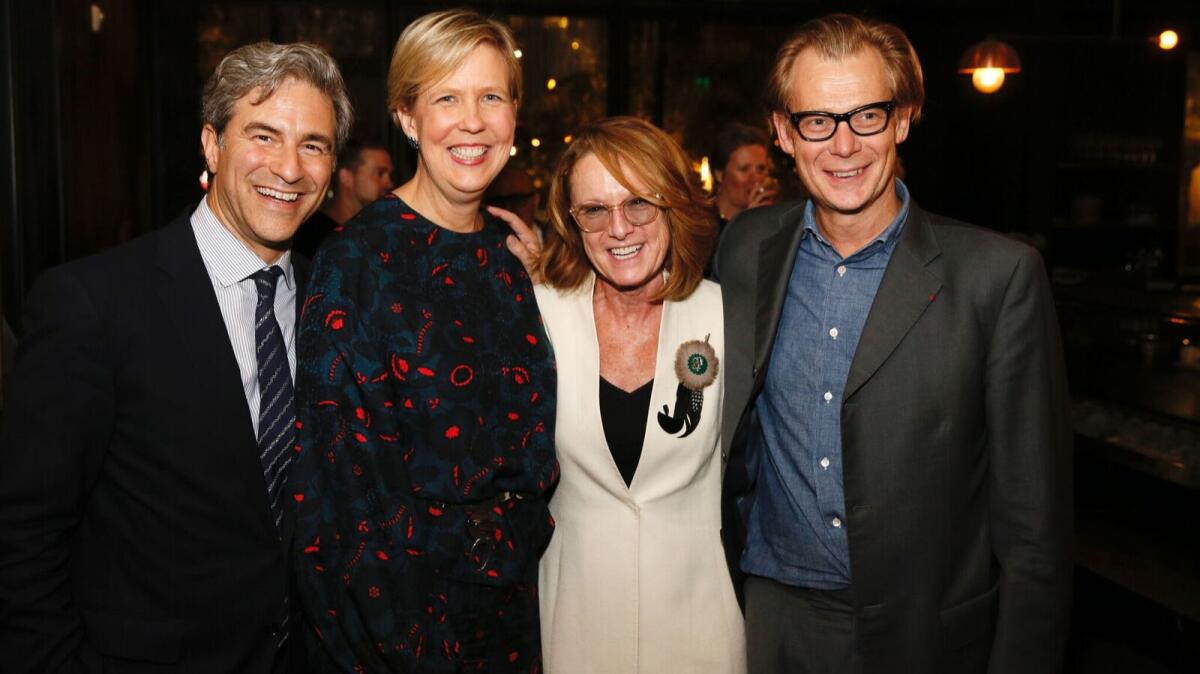 Los Angeles County Museum of Art Director Michael Govan, from left, Broad Founding Director Joanne Heyler, Hammer Museum Director Ann Philbin and Museum of Contemporary Art Director Philippe Vergne attend the post-exhibit-preview dinner at Otium in Los Angeles.