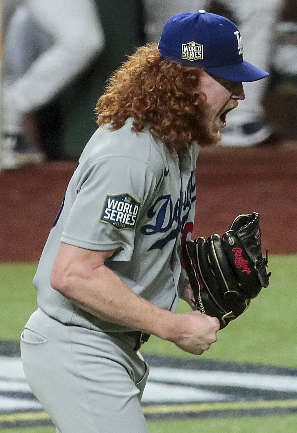 Dodgers pitcher Dustin May yells out.