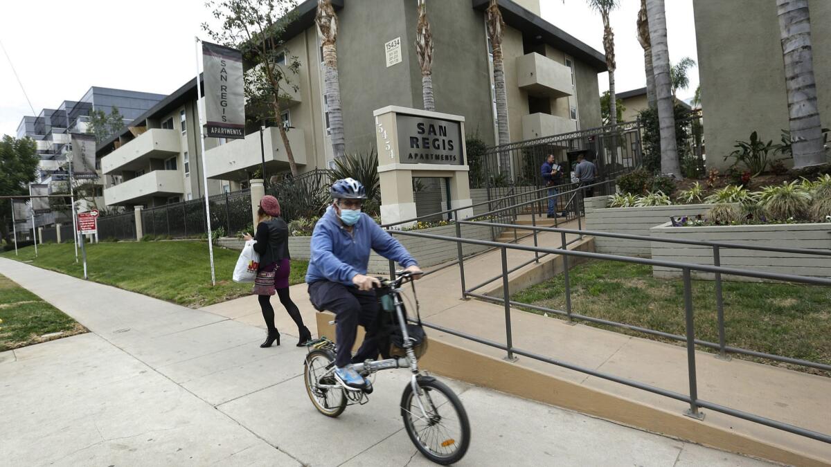 The San Regis apartment complex on Sherman Way in Van Nuys, seen in 2016. The owner of the complex has dropped an effort to roll back rent restrictions on some units.