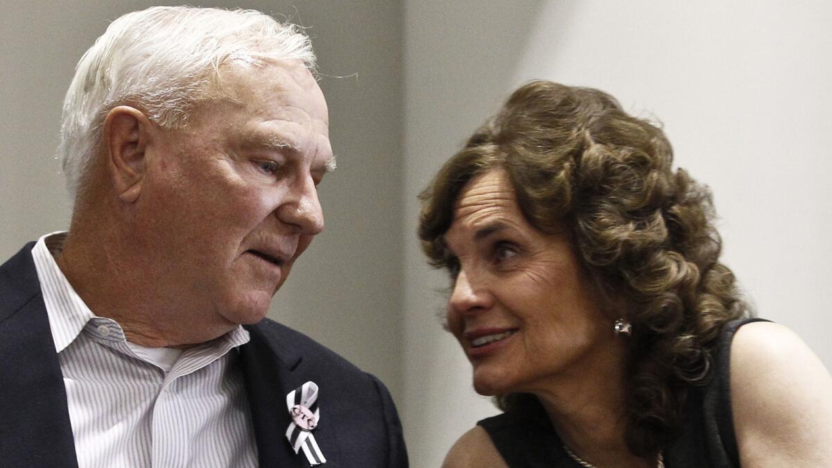 Bill Badger and his wife, Sallie Badger, at a 2012 news conference after the sentencing of Jared Loughner.