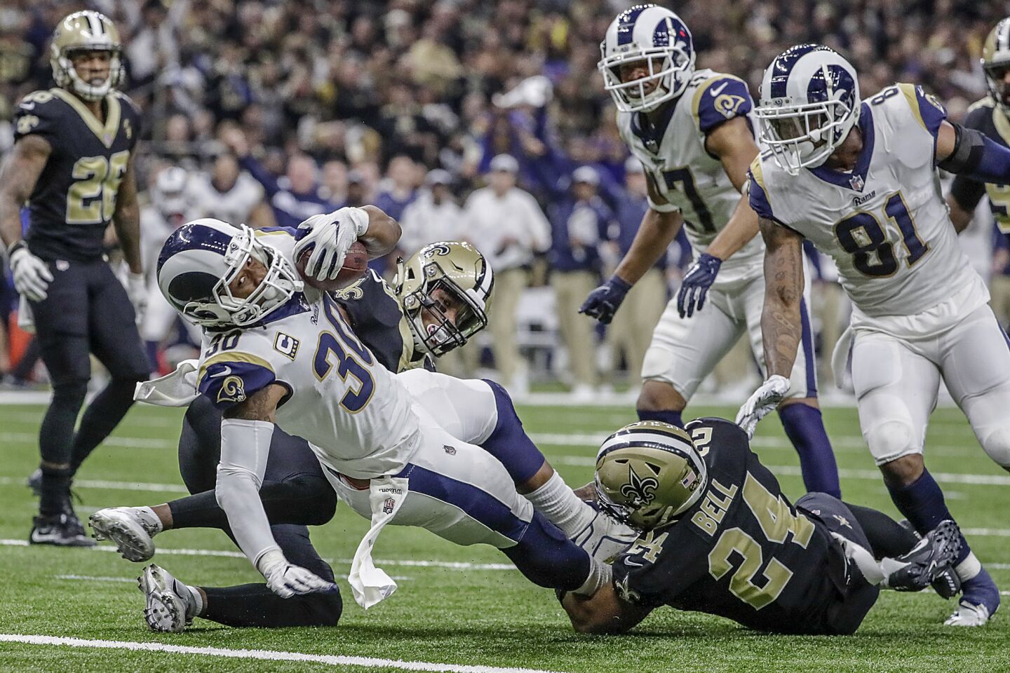 Rams running back Todd Gurley falls into the end zone for a touchdown late in the second quarter against the Saints in the NFC Championship at the Superdome on Jan. 20.