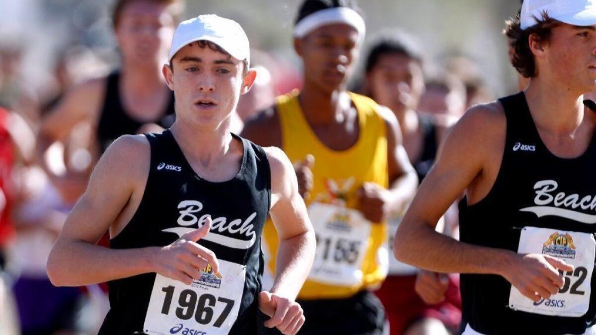 Ryan Smithers (left), seen on Nov. 18, 2017, leads a Laguna Beach boys' cross-country team that starts the year ranked No. 1 in the CIF Southern Section Division 4 poll.