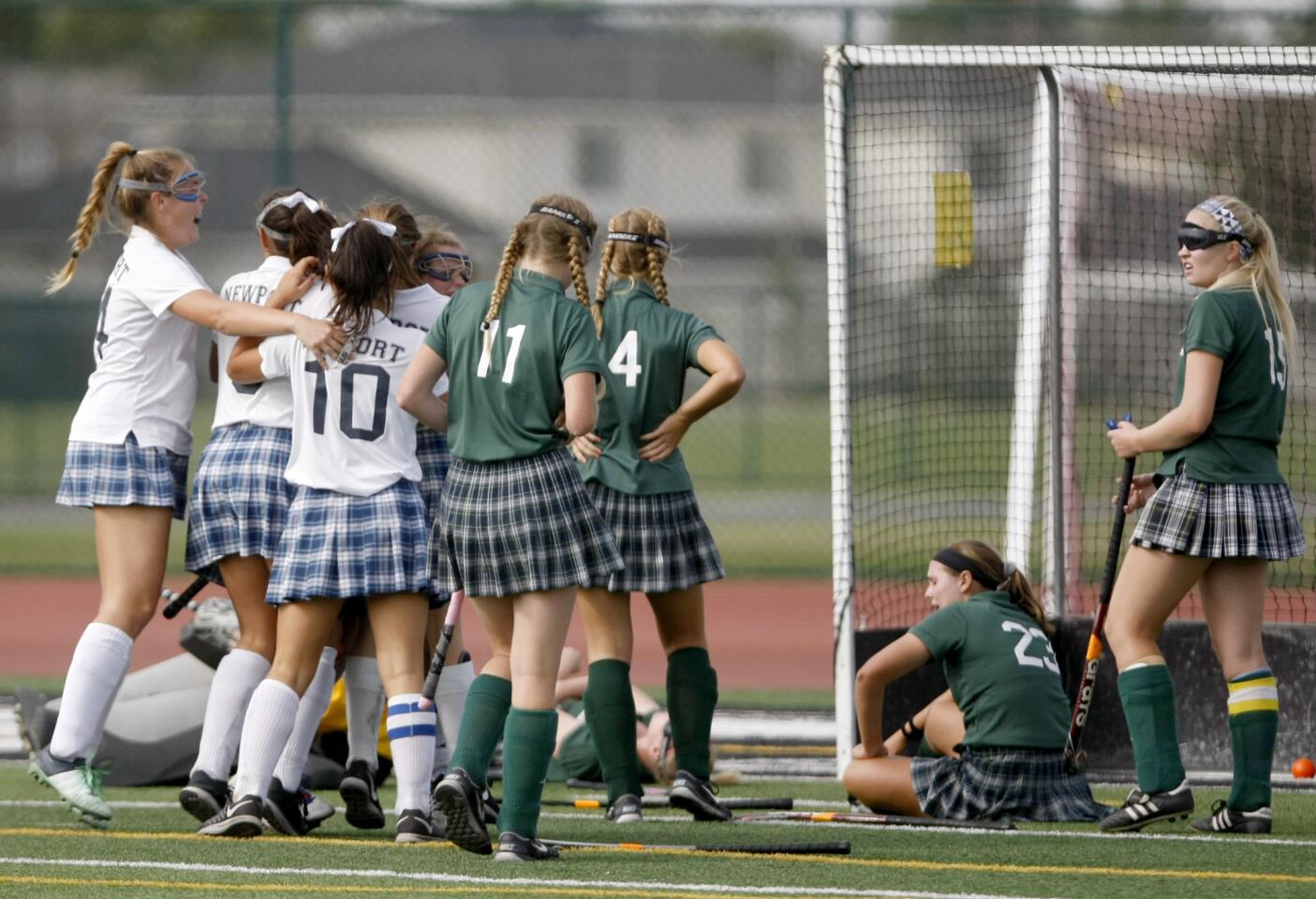Newport Harbor High School players celebrate an over-time goal that gave them the Tournament of Champions championship in field hockey title game vs. Edison High School, at Westminster High School in Westminster on Saturday, October 29, 2016. NHHS scored at 1:21 into the 10-minute overtime period.