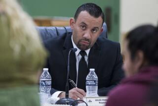 SAN YSIDRO, February 9th, 2017 | San Ysidro school board meeting on February 9, 2017 at Sunset Elementary School. Dr. Julio Fonseca, superintendent of San Ysidro School District, looks on as a concerned parent speaks of her child's hardships during the public commenting session. Chadd Cady for The San Diego Union-Tribune