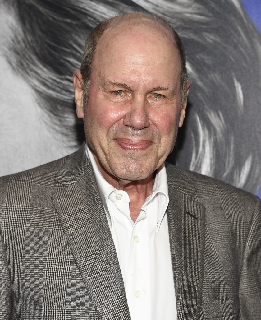 Michael Eisner in gray suit