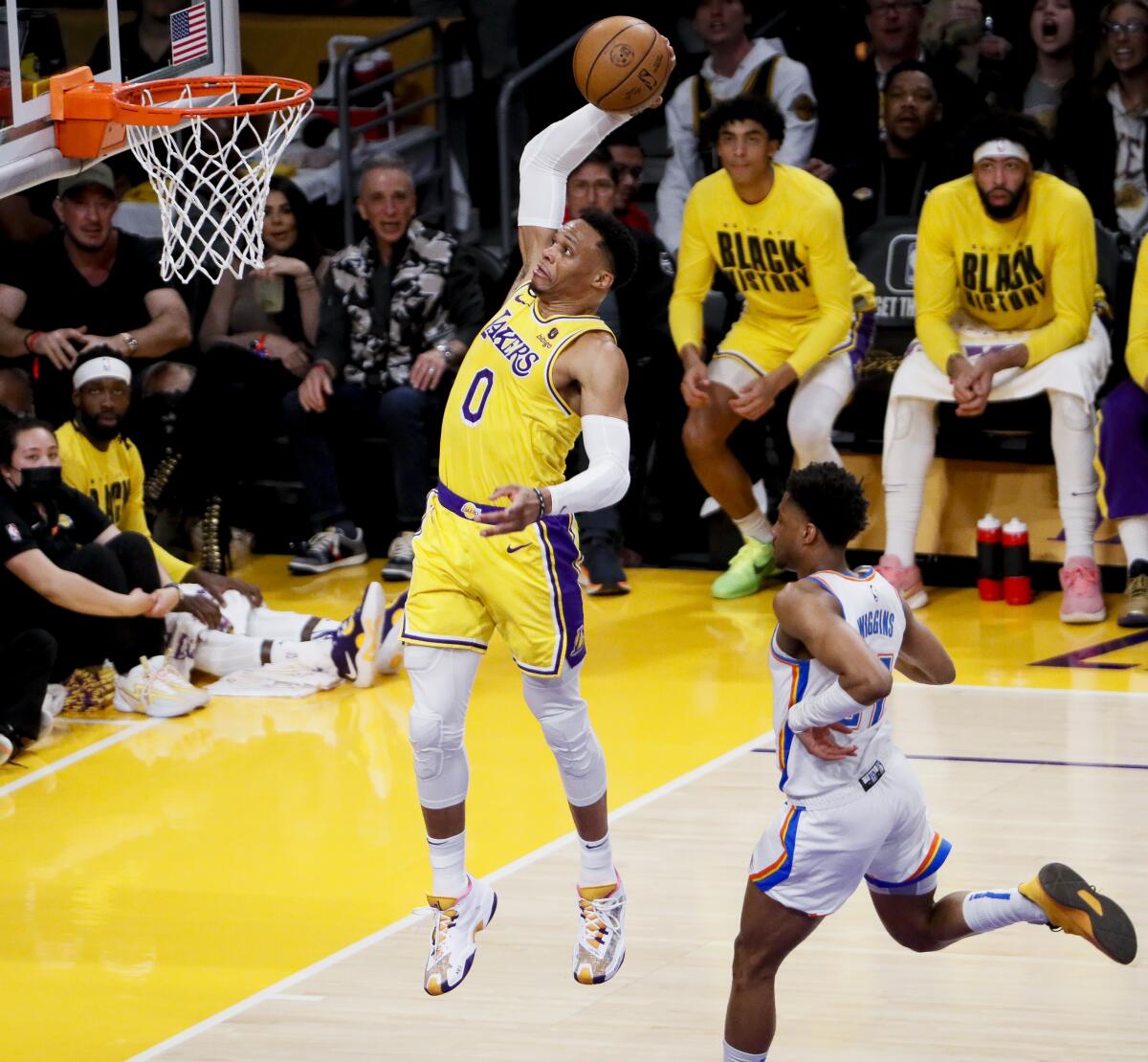 Lakers guard Russell Westbrook elevates for a tomahawk dunk.