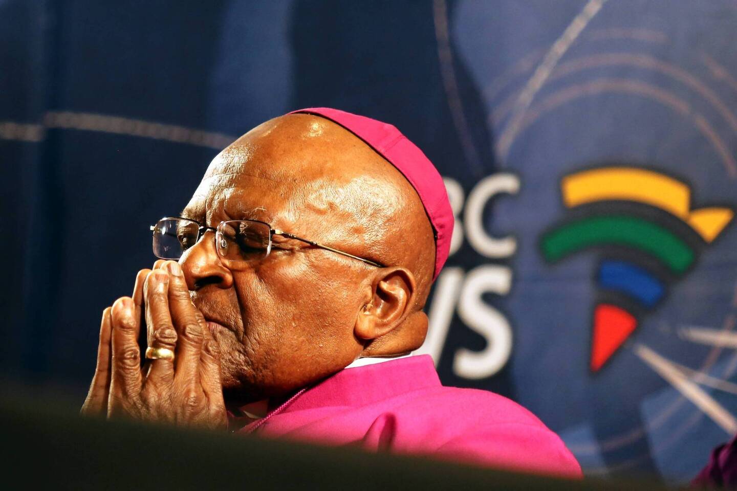 South Africa's Archbishop Desmond Tutu pauses for a moment during a media briefing in Cape Town, a day after the death of his friend and former South African President Nelson Mandela.
