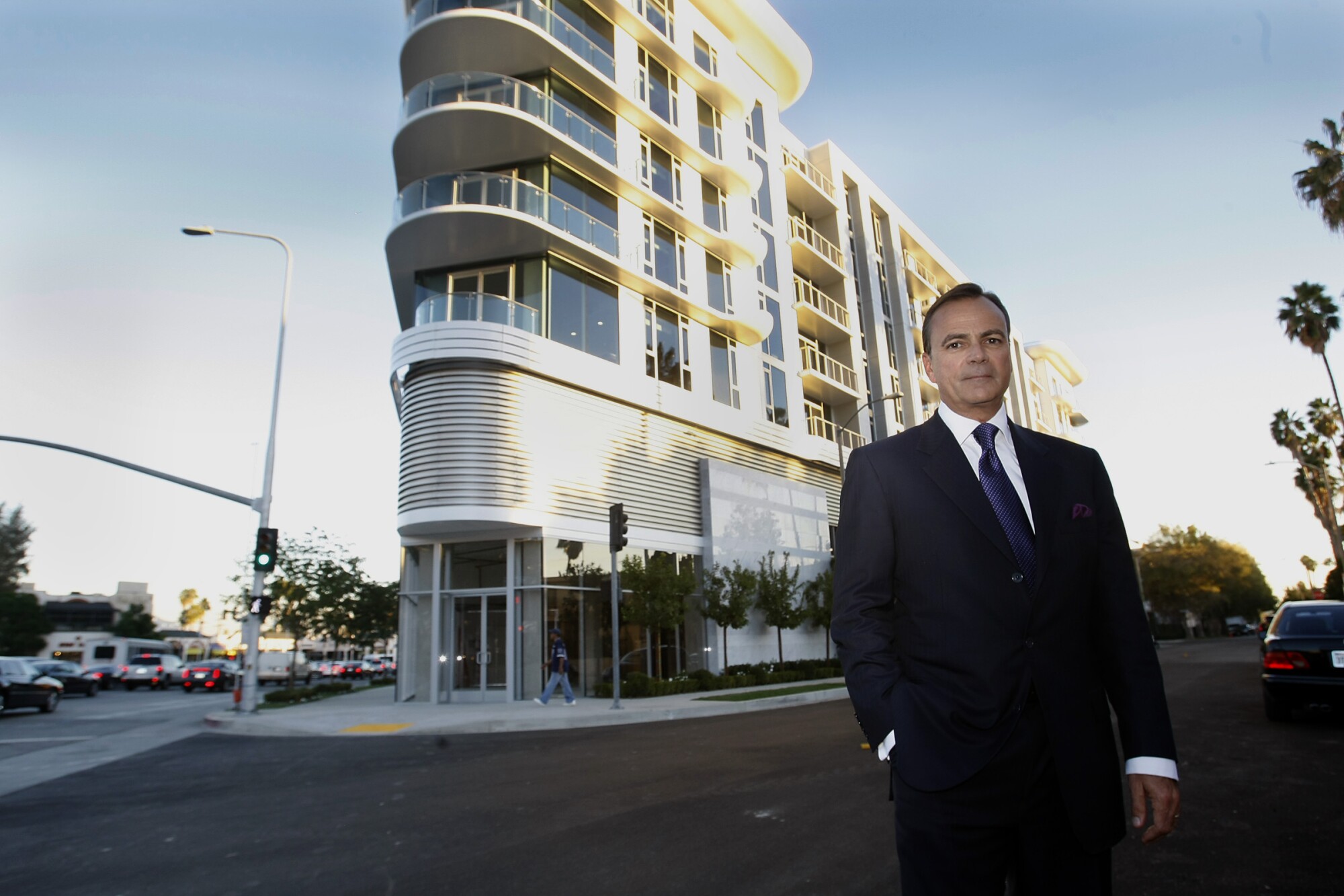 Caruso in 2012, in front of a $60-million apartment and retail complex near the Beverly Center.