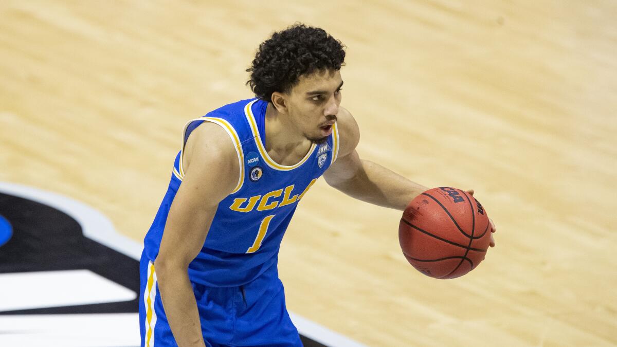 UCLA's Jules Bernard controls the ball during the Bruins' win over Michigan State in the First Four.