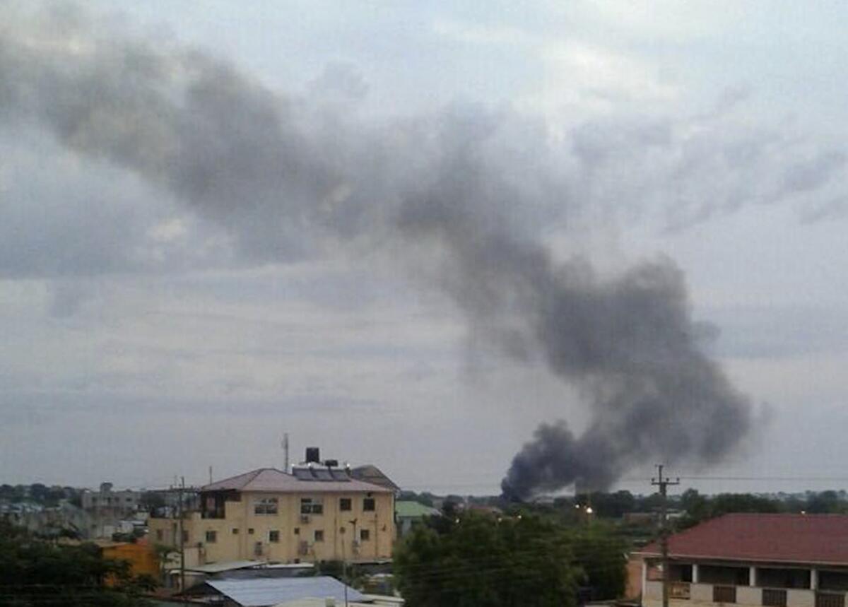 Smoke rises above Juba, the capital of South Sudan. Explosions and heavy weapons gunfire are shaking the city Monday in the fifth day of clashes between government and opposition forces.