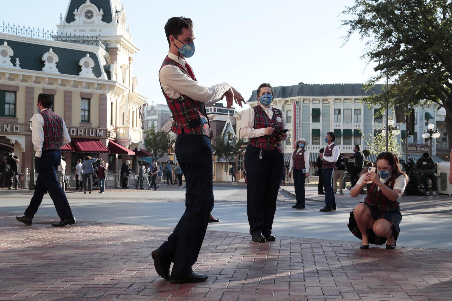 Disneyland employees take pictures before reopening