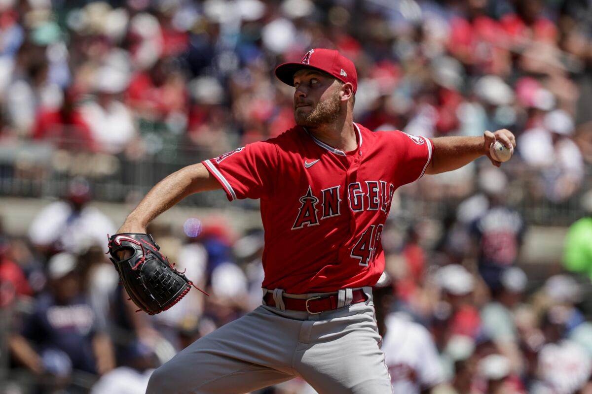 Angels starting pitcher Reid Detmers delivers during the first inning Sunday against the Atlanta Braves.