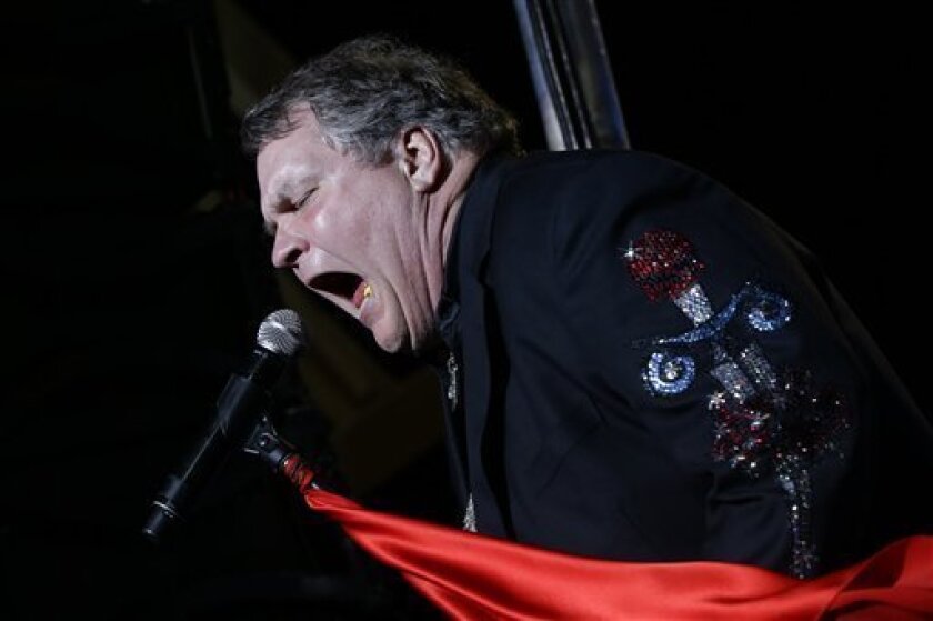 Singer Meat Loaf performs in support of Republican presidential candidate and former Massachusetts Gov. Mitt Romney at the football stadium at Defiance High School in Defiance, Ohio, Thursday, Oct. 25, 2012. (AP Photo/Charles Dharapak)