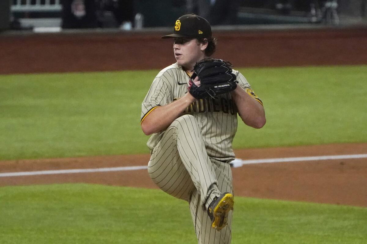 San Diego Padres relief pitcher Ryan Weathers throws to the Dodgers.