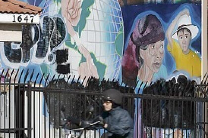 A mural on Beverly Boulevard celebrates the diverse culture of an area near downtown Los Angeles where Filipinos began settling in the 1920s.
