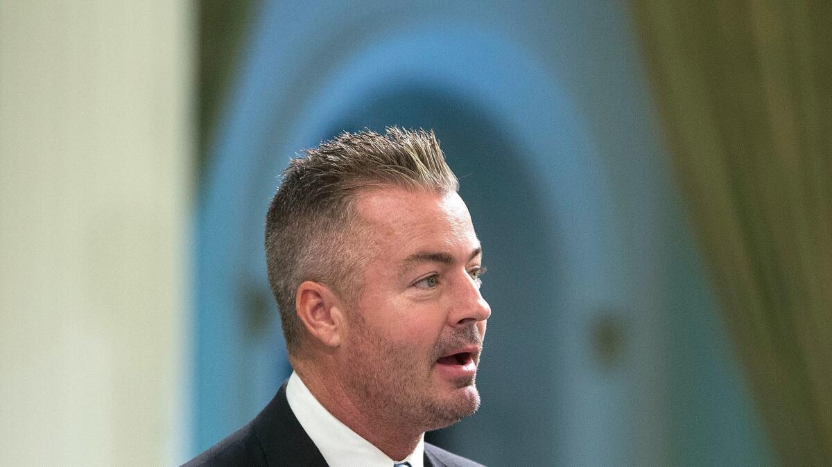 California Assemblyman Travis Allen (R-Huntington Beach) addresses the Assembly in Sacramento in 2016. He is the organizer of a campaign to repeal the gas tax increase.