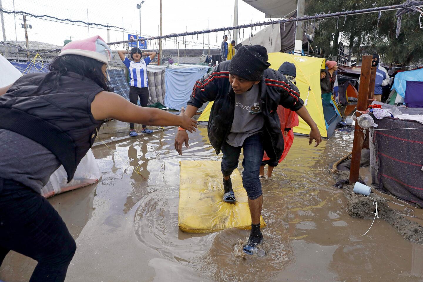 Rain drenches Tijuana migrant camp