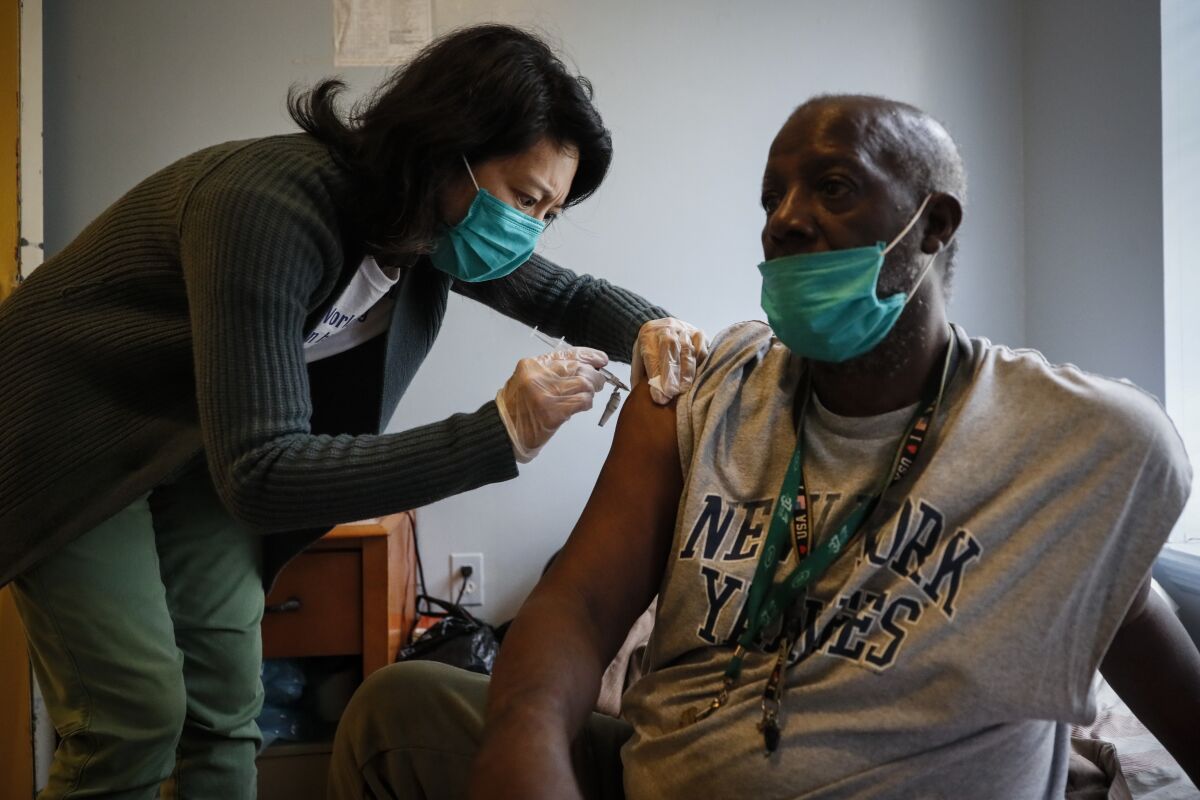 Dr. Jeanie Tse of the Institute for Community Living in New York City administers treatment.