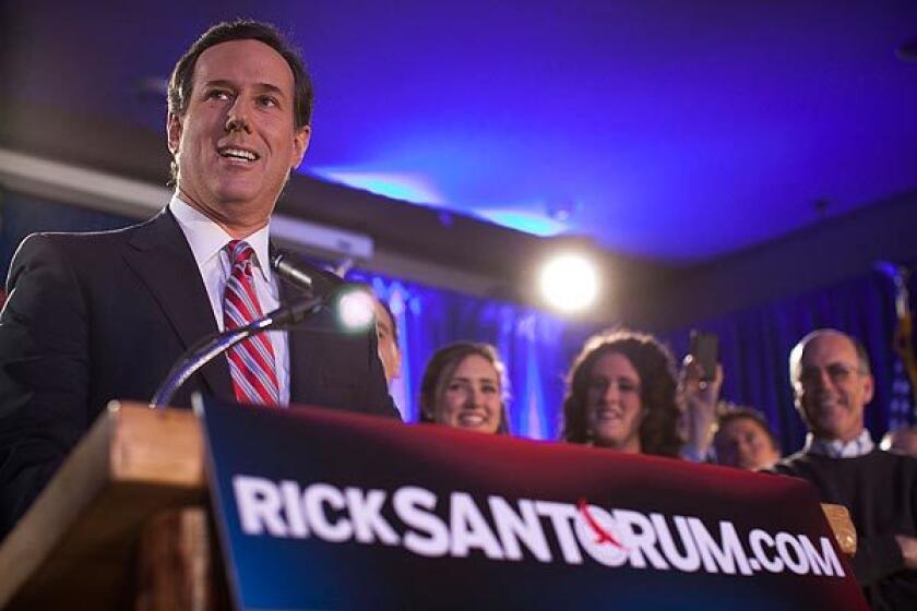 Former Pennsylvania Sen. Rick Santorum addresses a crowd at Stoney Creek Inn in Johnston, Iowa.