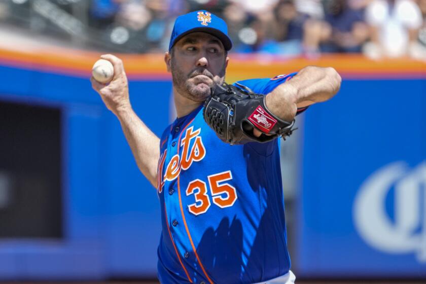 New York Mets pitcher Justin Verlander delivers against the Washington Nationals on July 30, 2023, in New York.