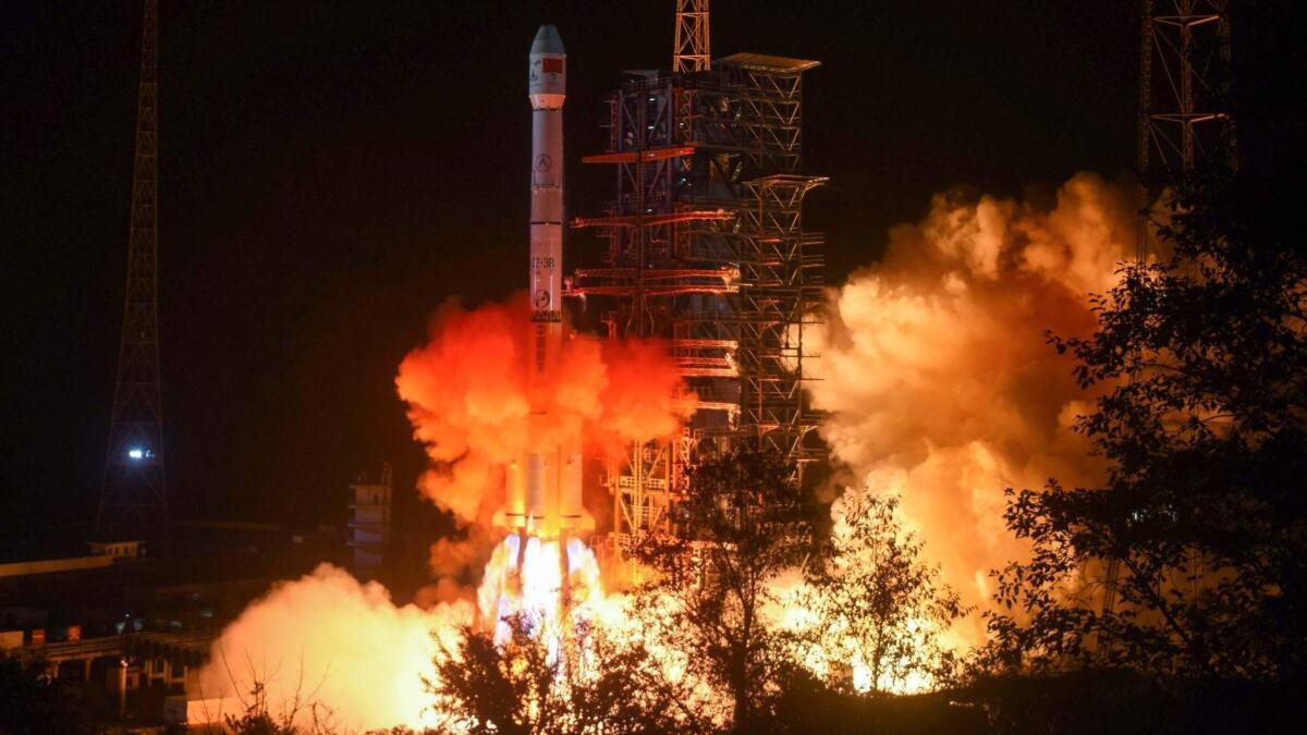 A Long March 3B rocket transporting the Chang'e-4 lunar lander launches Dec. 8.