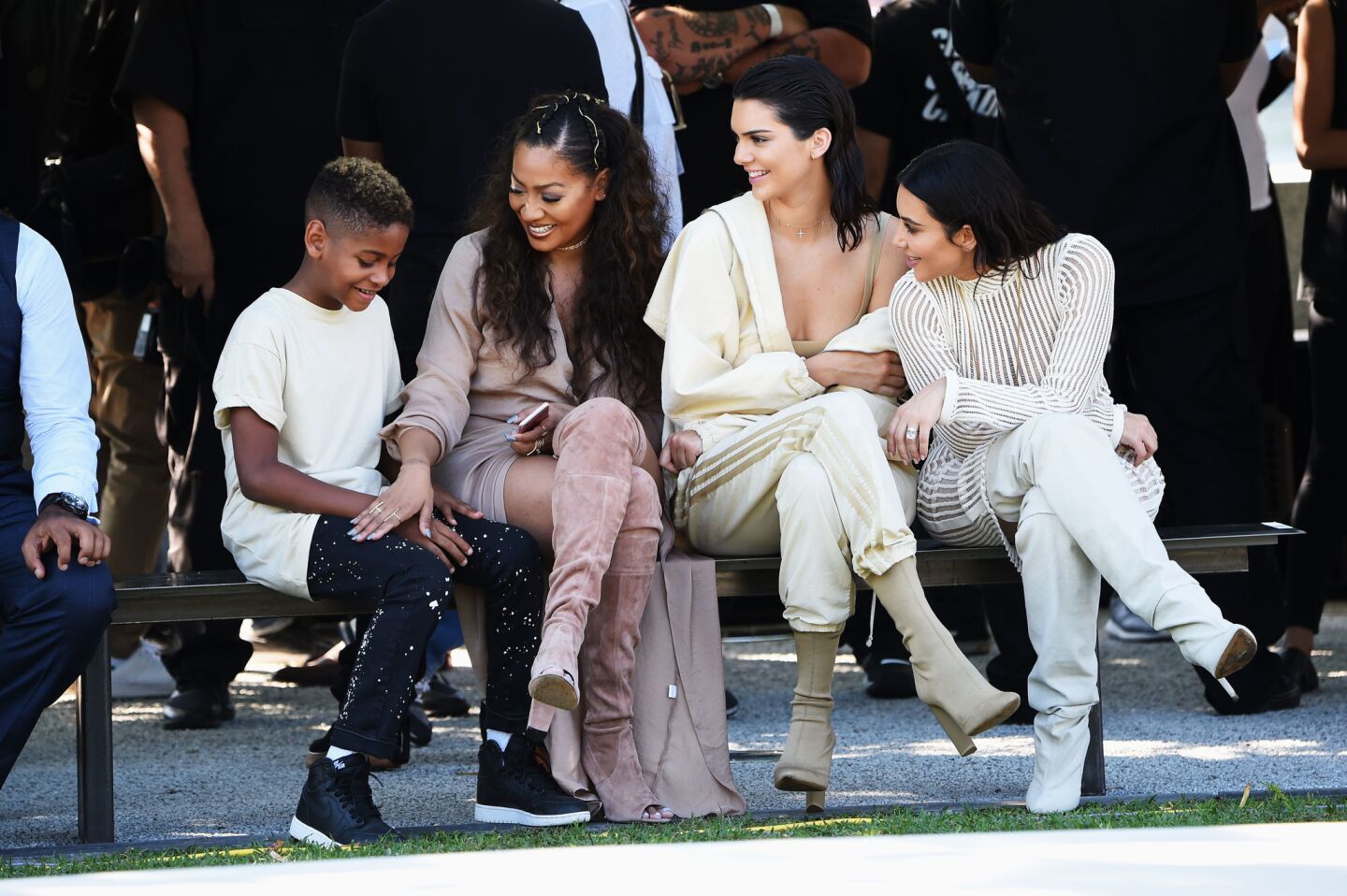 Kiyan Carmelo Anthony, left, La La Anthony, Kendall Jenner and Kim Kardashian attend the Kanye West Yeezy Season 4 fashion show.