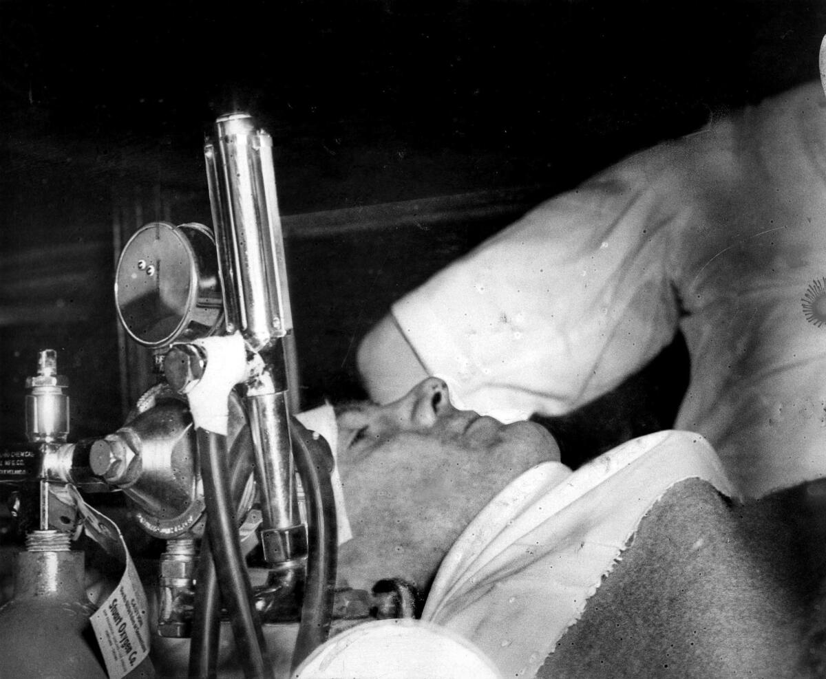 July 7, 1946: Howard Hughes is taken in an ambulance to Good Samaritan Hospital in Los Angeles after the XF-11 plane crash.
