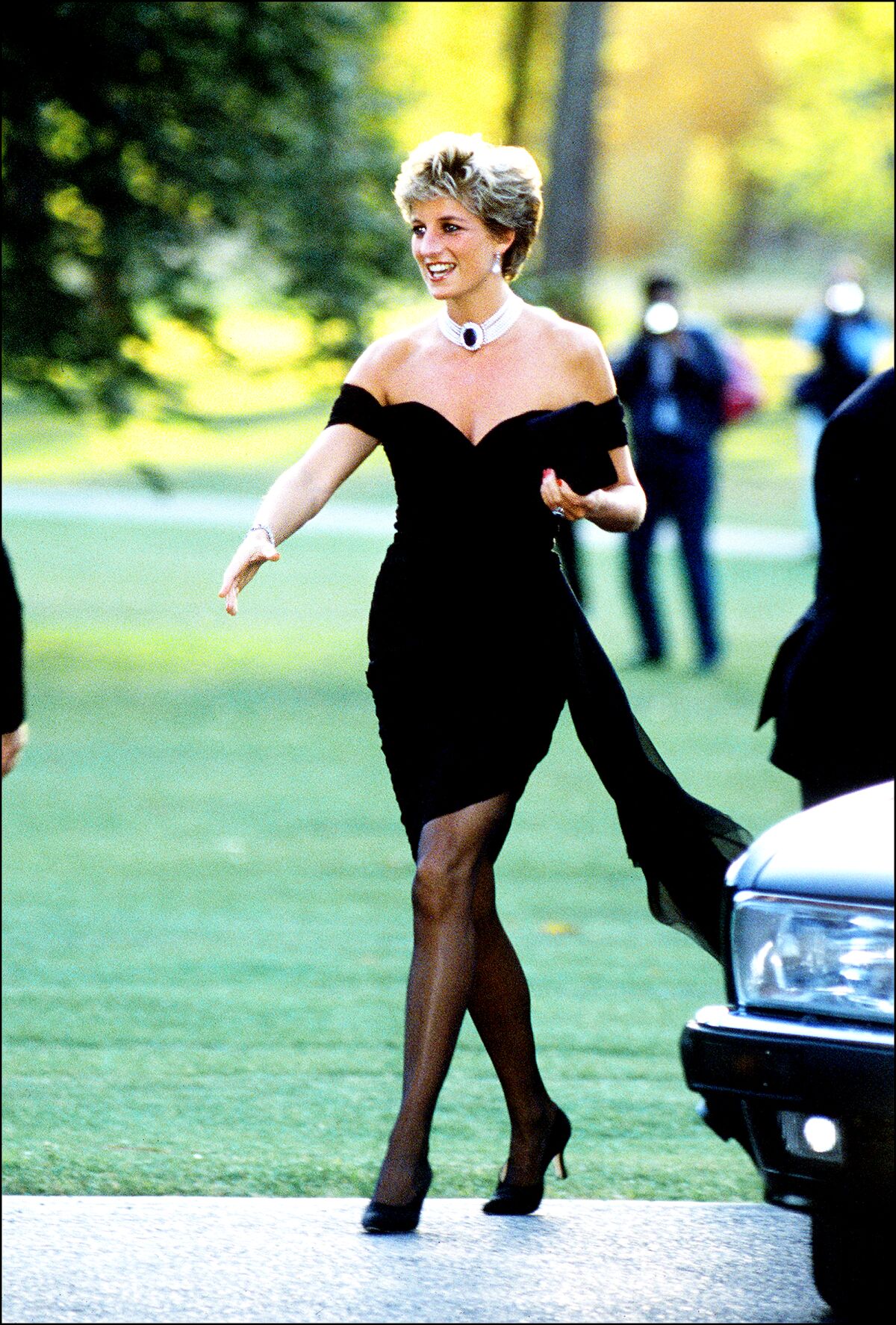 June 1994: Princess Diana wears an off-the-shoulder, short black dress by Christina Stambolian, known as the Revenge Dress.